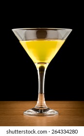 Lemon Martini On Brown Table And Black Background