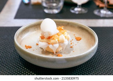 Lemon Meringue With Buttercream And Lemon Sorbet. Dessert Of Mod