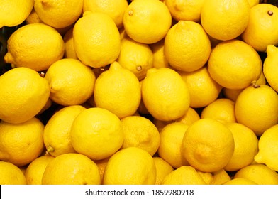 Lemon, Orange, Fresh Fruit Mix As Background, Top View. Fresh Citrus Fruit Market. A Pile Of Oranges Sitting On Top 