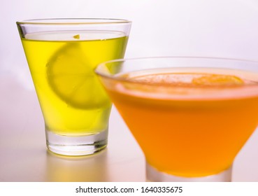 
Lemon And Orange Jelly In Glasses On A White Background.