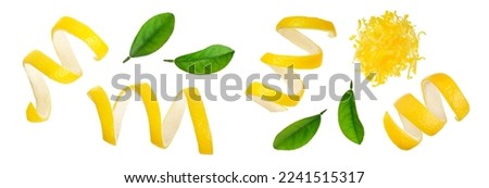 Lemon peel with leaf isolated on white background without a shadow. Healthy food