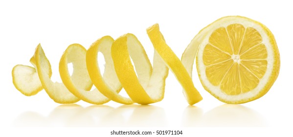The lemon skin is twisted in a spiral with reflection on an isolated white background