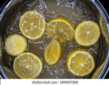 Lemon Slices Swimming In Boiling Sugar Water Top View