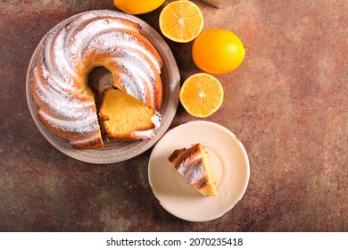 Lemon and sour cream ring cake, with icing sugar on top - Shutterstock ID 2070235418