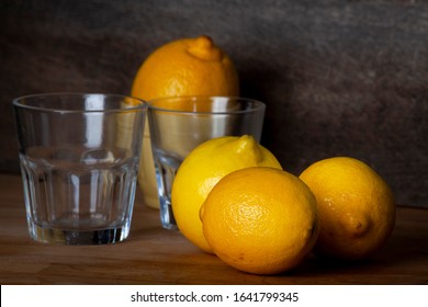 lemon stil life on wooden deskwith a lot of changes on photo such as different objects and different lighting all studio shot