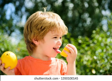 Lemon Taste. The Child Tastes The Sour Taste Of Lemon.