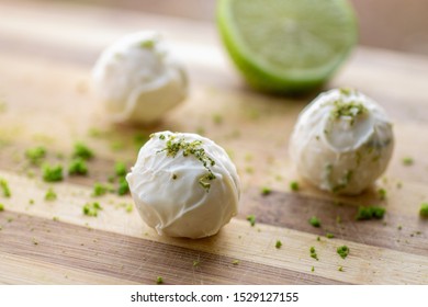 Lemon Truffles On Wooden Board