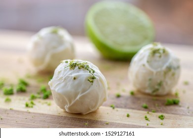 Lemon Truffles On Wooden Board