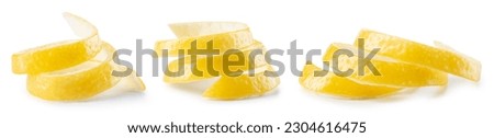 Lemon twisted peel isolated. Lemon fruit zest on white background. Citrus zest. Lemons isolated. With clipping path. Full depth of field.