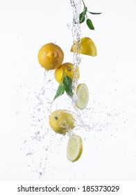 Lemon With Water Splash Isolated On White