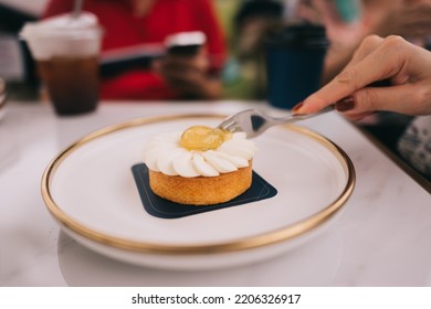 Lemon Yuzu Tart On White Plate