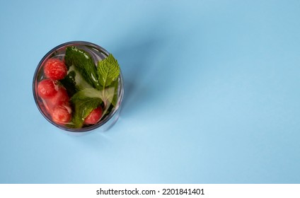 Lemonade With Carved Watermelon And Mint Balls On A Blue Background. Flat Lay, Top View, Copy Space