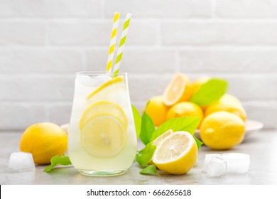 Lemonade. Drink With Fresh Lemons. Lemon Cocktail With Juice And Ice.