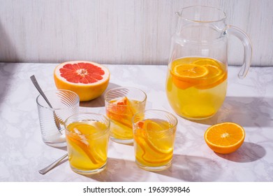 Lemonade. Drink With Fresh Orange, Lemon And Grapefruit. Lemon Cocktail With Juice. Citrus Lemonade In Glass Jur. Refreshing Summer Drink