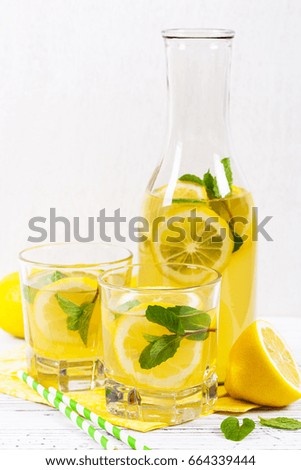 Lemonade Drink with Lemon Juice. Selective focus.