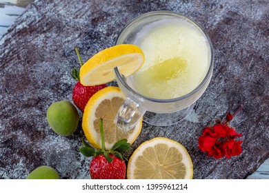 Lemonade With Ice. Fresh Lemonade With Strawberry, Mint Shot Top Down On Rustic Table.