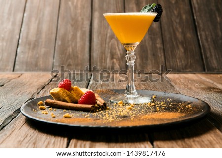 Lemonade or juice. Alcohol drink or cocktail. Images for bar or restaurant menu. Drink with ice in martini glass.