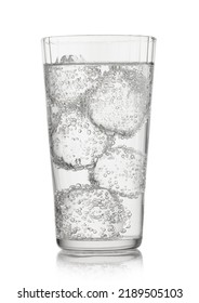 Lemonade Sparkling Mineral Water With Ice Cubes And Bubbles On White.