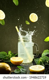 Lemonade Splash  On Dark Background.