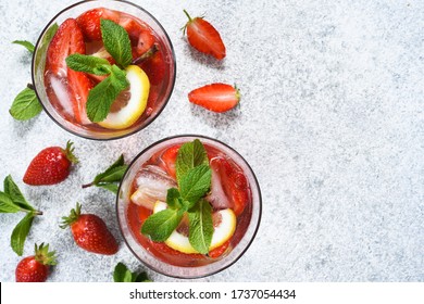 Lemonade With Strawberries And Mint On A Concrete Background. View From Above. Summer Cold Drink.