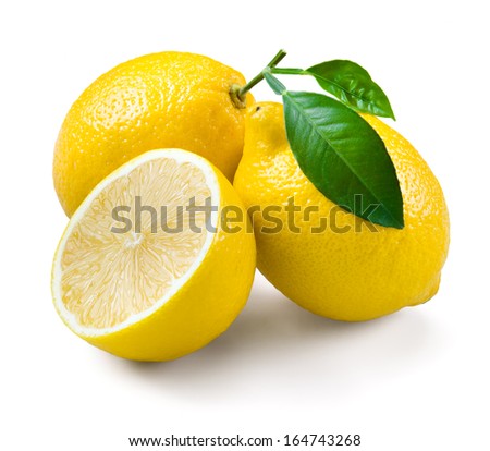 Lemons with leaves on a white background.