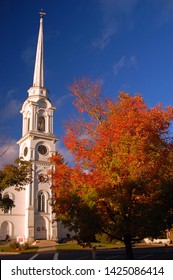 L:emox, MA, USA October 11 Autumn Colors Compliment A Traditional New England Church In Lenox, Massachusetts