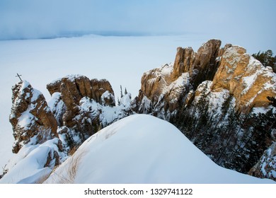 The Lena Pillars Is A Geological Formation And A Natural Park Of The Same Name In Russia, On The Banks Of The Lena River. Located In Khangalassky District Of Yakutia, 104 Km From The City Of Pokrovsk.