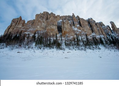 The Lena Pillars Is A Geological Formation And A Natural Park Of The Same Name In Russia, On The Banks Of The Lena River. Located In Khangalassky District Of Yakutia, 104 Km From The City Of Pokrovsk.