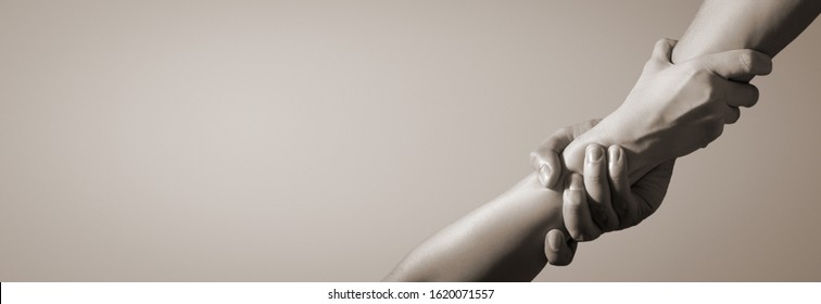 Lending helping hand. Concept of help, support and solidarity. - Shutterstock ID 1620071557
