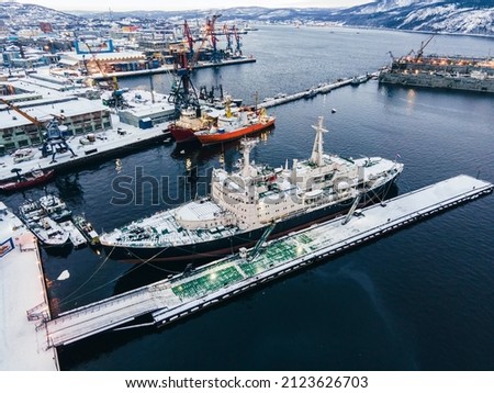 Lenin Soviet nuclear-powered icebreaker in port of Murmansk among the ships. Top view.