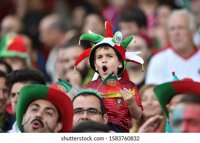 LENS AGGOLO FRANKREICH STADE BOLLAERT DELELIS 25.Juni 2016 Fussball EURO 2016 Kroatien Vs Portugal

Male Portuguese Fan Celebrates His Team