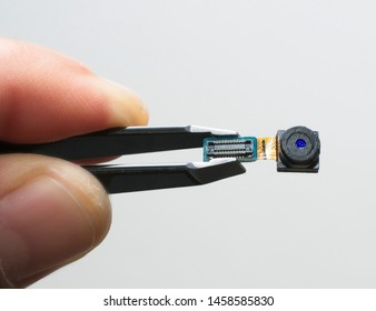 Lens, electronic circuit and sensor box of a micro camera.
