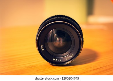 Lens fixed focal length with exposed background and warm colors