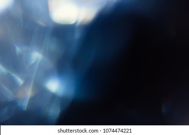 lens flare abstract light glow. optical abstract flash. soft defocused blur. black background