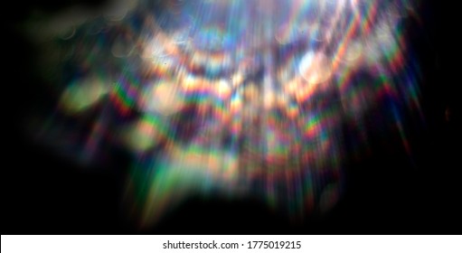 Lens Flare Effect On Black Background. Abstract Sun Burst, Sunflare For Screen Mode Using. Sunflares Nature Abstract Rainbow Colourful Backdrop, Blinking Sun Burst, Lens Flare Optical Rays.