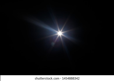 Lens Flare. Light over black background. Easy to add overlay or screen filter over photos. Abstract sun burst with digital lens flare background. Gleams rounded and hexagonal shapes, rainbow halo. - Shutterstock ID 1454888342