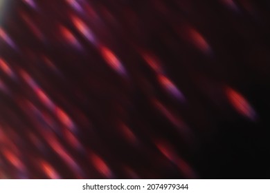 Lens Flare Overlay. Bokeh Light. Flash Leak. Blur Optical Rays. Defocused Neon Red Purple Sparks Glow On Dark Night Abstract Background.