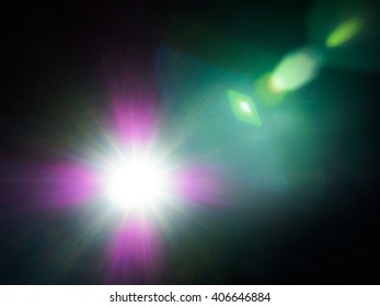 Lens Flare Of Strong Light Source In The Dark, Abstract Background