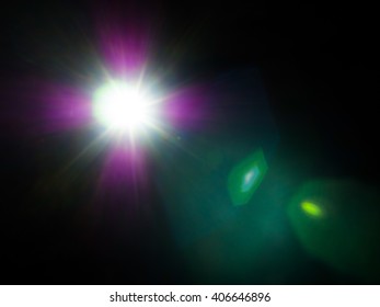 Lens Flare Of Strong Light Source In The Dark, Abstract Background