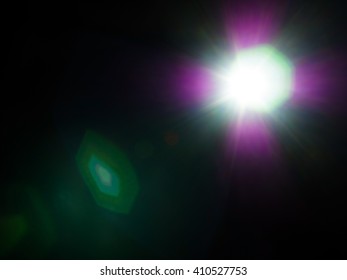 Lens Flare Of Strong Light Source In The Dark, Abstract Background