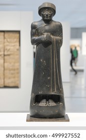 LENS, FRANCE, 2016/08/03. Diorite Statue Of Gudea, Prince Of Lagash Found In Girsu (today's Tello) In Mesopotamia (today's Iraq). The Louvre Museum In Lens.