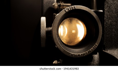 Lens of an old movie projector in close up view - macro shot
