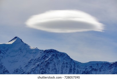 Lenticular Cloud With Mountain