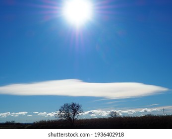 Lenticular Cloud In The Turquoise Blue Sky, Lerida, Spain, Europe