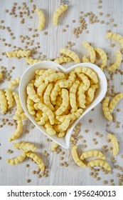 Lentil Chips On Wooden Surface