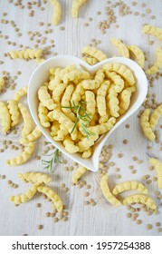 Lentil Chips On Wooden Surface