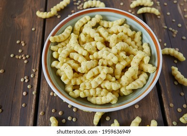 Lentil Chips On Wooden Surface