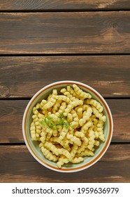 Lentil Chips On Wooden Surface