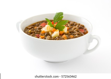 Lentil soup in a bowl, isolated on white background

