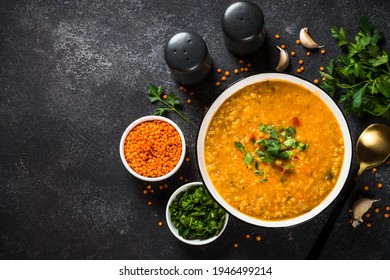 Lentil Soup With Vegetables On Black Stone Table.